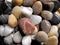 Polished coloured pebbles close up