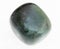 polished heliotrope (bloodstone) gem on white