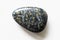 Polished kambaba jasper gemstone on a white background