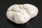 polished magnesite stone on dark background