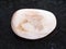 polished moonstone gemstone on dark background