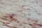 Polished natural stone, beige with red dots Ivory Brown granite