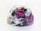 polished pink Corundum crystals in rock on white