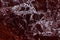 The polished red marble. Texture. The finishing stone.