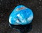 polished Shattuckite rock on black