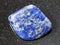 polished Sodalite gemstone on dark background