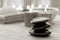 Polished Stone Cairn and Candles Burning in a Spa