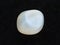 polished translucent moonstone gemstone on dark