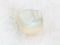 polished translucent moonstone gemstone on white