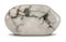 Polished white howlite stone, isolated on white background