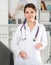 Polite female health worker meeting patient in office