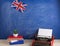Political, news and education concept - red typewriter, flag of the United Kingdom, books on table
