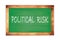 POLITICAL  RISK text written on green school board
