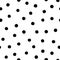 Polka dot seamless pattern in hand draw style. Vector spot texture with black point isolated on white background. Grunge