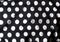 Polka dot silk fabric background. Abstract and textile original black fabric background