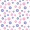 Polka dot with small hand drawn flowers. Pink and purple on a white background. Randomly placed elements