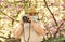 Pollen allergy. Tourist camera photo. Nature photography. Senior man respirator mask. Professional photographer work