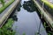 Polluted canal and dirty sewer in an urban area in Bangkok thailand. Polluted water and garbage are serious subject of Thailand