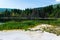 Polluted lake with kaolin on abandoned quarry with beautiful blue sky