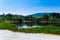 Polluted lake with kaolin on abandoned quarry with beautiful blue sky