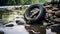 Polluted riverbank with abandoned tires, visual pollution