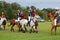 Polocrosse players on their horses