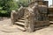 Polonnaruwa Sri Lanka Ancient ruins Statues at entrance to shrine beside stairs