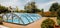 Polycarbonate Cover. Outdoor swimming pool with automatic pool cover