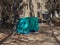 Polyethylene shelter for the homeless in a city park, a man hid in a hut