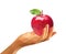 Polygonal hand holding a red apple