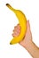 Polygonal hand holds yellow banana white