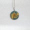 Polymer clay necklace pendant blue and gold swirl