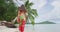 Polynesia Travel woman walking on paradise beach on holidays vacation Bora Bora