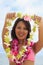 Polynesian girl with flower lei