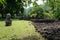 Polynesian old stone structure and statue Tahiti