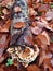 Polypore mushrooms growing on deadwood surrounded by tan foliage