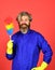 Polypropylene duster. Hipster holding cleaning tool. Cleaning home concept. Small colorful duster broom. Cleaning