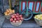 Pomegranate and citrus fruits oranges and grapefruit in large baskets in a street market or bazaar. street trading concept.