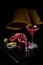 Pomegranate Martini in a night club bar garnished with fruits