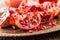 Pomegranate. Pieces of frest pomegranate on plate