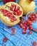 Pomegranate seeds and beautiful blue background, tropical fruits red seeds sweet and good for health. Super fruits concept.