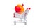 Pomegranate in shopping cart isolated on white background