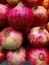 Pomegranates for sale at a farmers market,