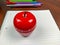 Pomodoro study technique with a kitchen timer in a shape of an apple for setting an alarm for better productivity and study