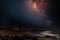 Pomorie town with lights and hotels against the backdrop of the night sky and the Black Sea in Bulgaria