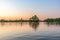 A pond in a city park Tsaritsino on a summer evening with people on boats. Moscow, Russia