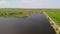 Pond and a country road near lake Okeechobee