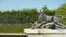 Pond with a lion sculpture at Versailles. France