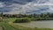 Pond in Lukov village in summer sunny morning