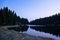 Pond named Flossteich near Neue Welt village in german Ore Mountains during blue hour in spring